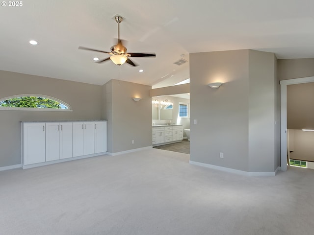 907 NW 90th St, Vancouver, WA 98665 - unfurnished living room with light carpet, ceiling fan, lofted ceiling, plenty of natural light, and recessed lighting