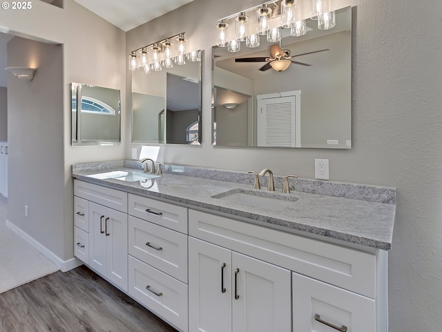 907 NW 90th St, Vancouver, WA 98665 - full bath featuring double vanity, a ceiling fan, and wood finished floors