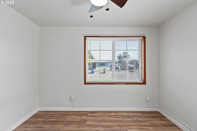 2745 C St, Springfield, OR 97477 - spare room featuring wood finished floors, ceiling fan, and baseboards