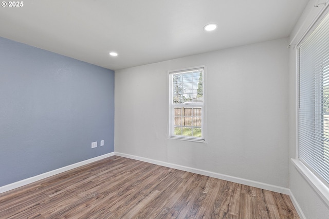 2745 C St, Springfield, OR 97477 - empty room featuring wood finished floors, baseboards, and recessed lighting