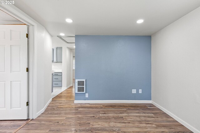 2745 C St, Springfield, OR 97477 - empty room featuring wood finished floors, baseboards, recessed lighting, and heating unit