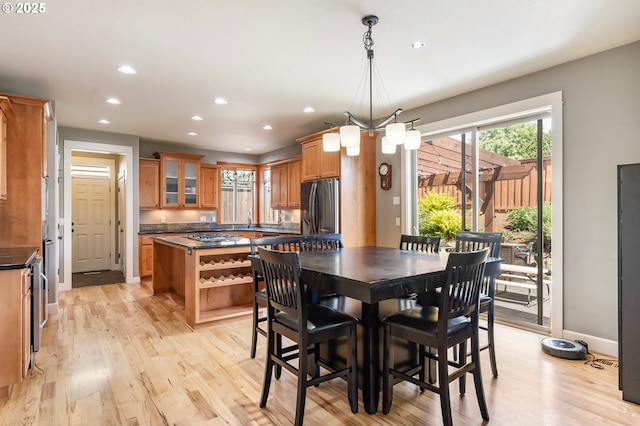14390 SW Connor Pl, Portland, OR 97224 - dining space featuring recessed lighting, light wood-style flooring, and a chandelier