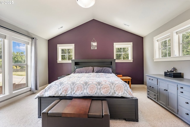 14390 SW Connor Pl, Portland, OR 97224 - bedroom featuring light carpet, lofted ceiling, and multiple windows