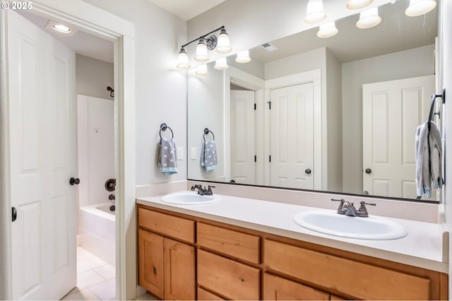 14390 SW Connor Pl, Portland, OR 97224 - full bath with double vanity, tile patterned flooring, and shower / tub combination