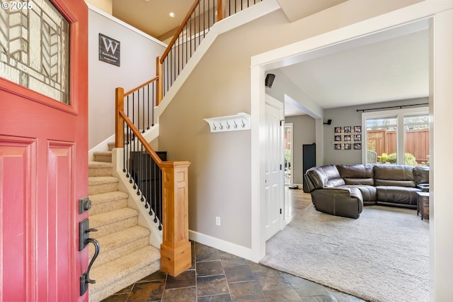 14390 SW Connor Pl, Portland, OR 97224 - entryway featuring stairway and dark stone finish flooring