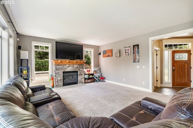14390 SW Connor Pl, Portland, OR 97224 - living area featuring healthy amount of natural light, carpet floors, and a fireplace