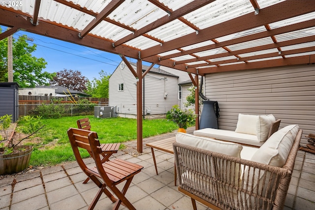 view of patio / terrace with fence, a pergola, and an outdoor hangout area