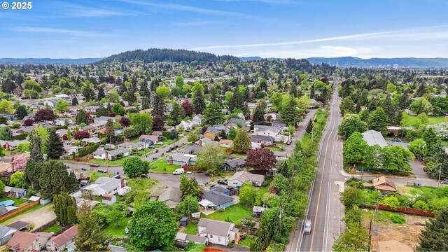 bird's eye view featuring a residential view and a mountain view