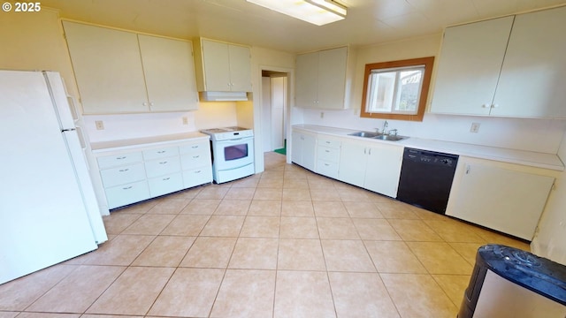 kitchen featuring sink, white appliances, white cabinets, and light tile patterned flooring