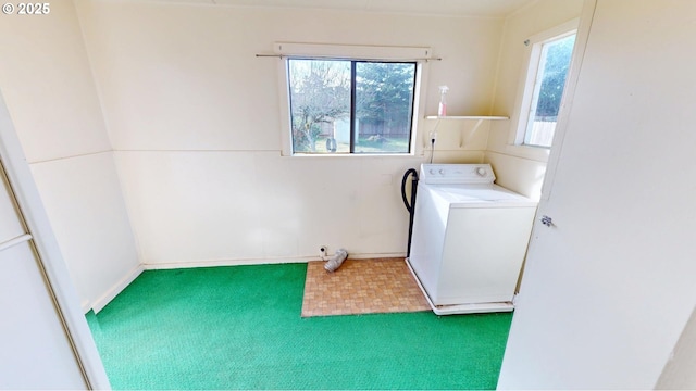 washroom with washer / clothes dryer