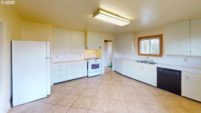 kitchen featuring white cabinetry, sink, light tile patterned floors, and white appliances