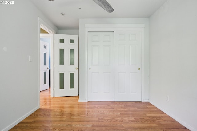 18522 SW Mcclarey Dr, Beaverton, OR 97007 - unfurnished bedroom featuring light wood finished floors, a closet, and baseboards