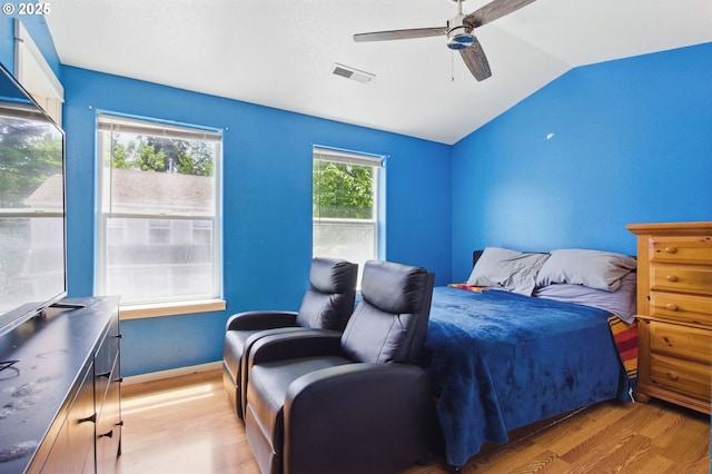 18522 SW Mcclarey Dr, Beaverton, OR 97007 - bedroom featuring light wood-style floors, vaulted ceiling, and ceiling fan