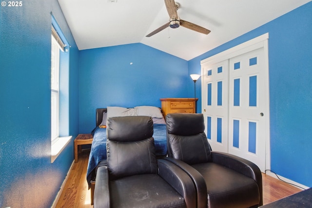 18522 SW Mcclarey Dr, Beaverton, OR 97007 - cinema with a ceiling fan, wood finished floors, and vaulted ceiling