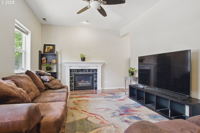 18522 SW Mcclarey Dr, Beaverton, OR 97007 - living area with ceiling fan, a fireplace, and wood finished floors