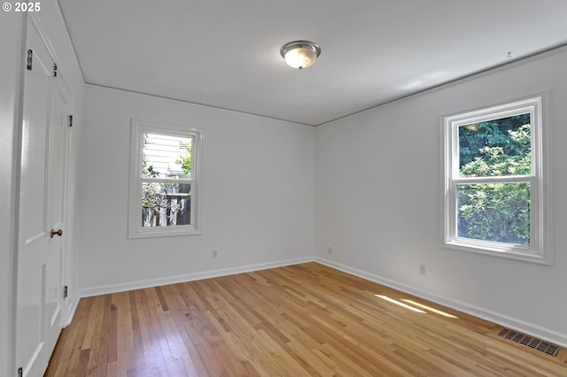 4580 NE 35th Pl, Portland, OR 97211 - spare room featuring light wood-style floors and baseboards