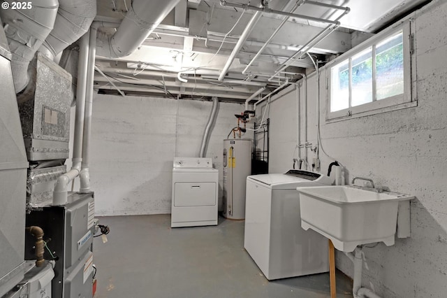 4580 NE 35th Pl, Portland, OR 97211 - basement featuring water heater, washer and dryer, a sink, and heating unit