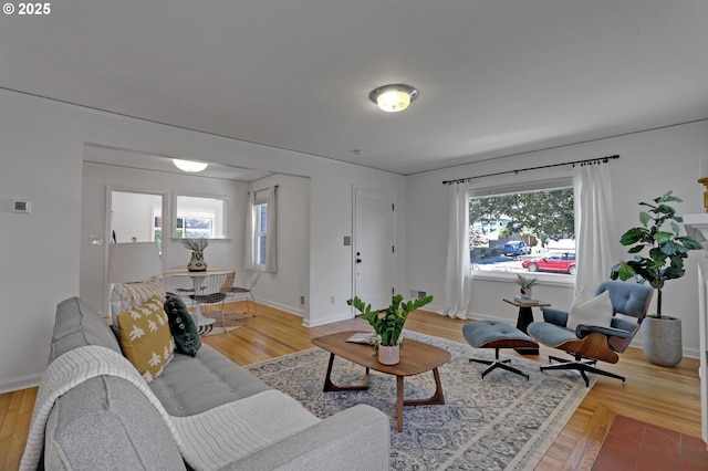 4580 NE 35th Pl, Portland, OR 97211 - living area featuring baseboards and light wood-style floors