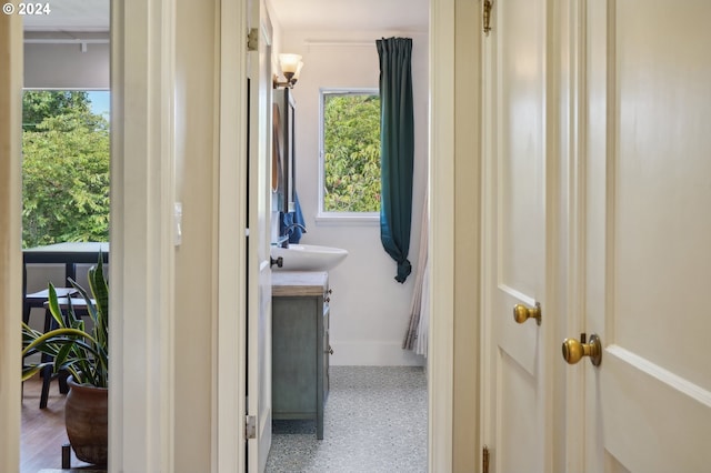 corridor with speckled floor