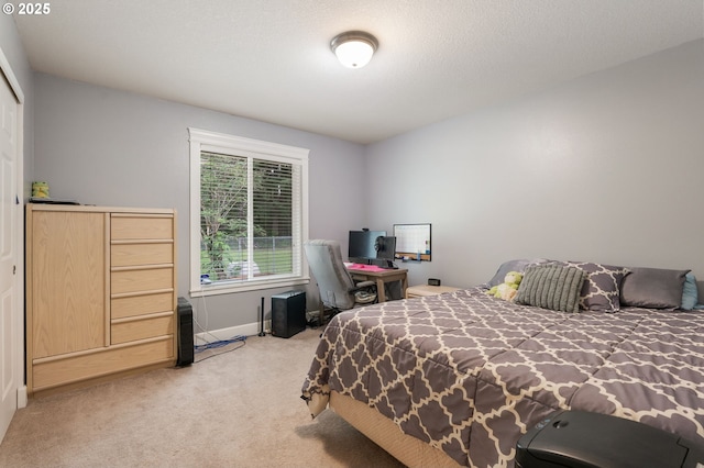 31529 SE Eagle Cliff Ln, Eagle Creek, OR 97022 - bedroom with light carpet, baseboards, and a closet