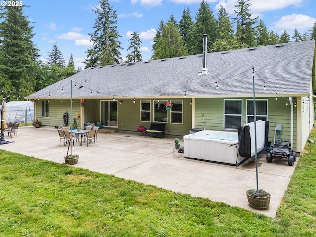 31529 SE Eagle Cliff Ln, Eagle Creek, OR 97022 - back of property featuring a hot tub, a shingled roof, a yard, and a patio area