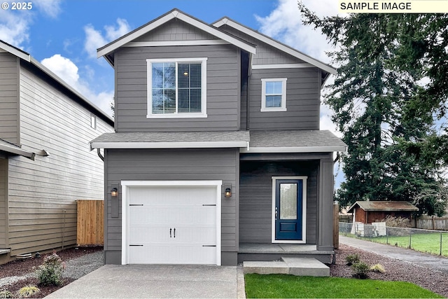 view of front of home featuring fence, concrete driveway, an attached garage, and a shingled roof