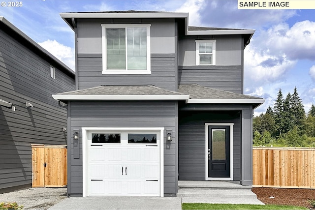 contemporary home featuring concrete driveway, an attached garage, fence, and a shingled roof