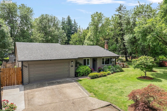 2648 SE Risley Ave, Milwaukie, OR 97267 - view of front of home featuring driveway, a garage, a shingled roof, and a chimney