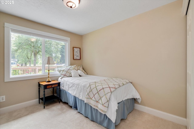 2648 SE Risley Ave, Milwaukie, OR 97267 - bedroom featuring carpet and baseboards