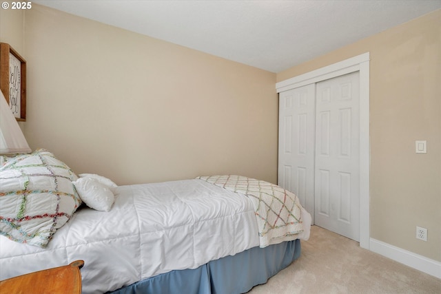 2648 SE Risley Ave, Milwaukie, OR 97267 - carpeted bedroom with a closet and baseboards