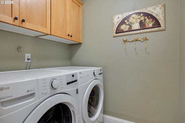 2648 SE Risley Ave, Milwaukie, OR 97267 - laundry room featuring cabinet space and washing machine and dryer