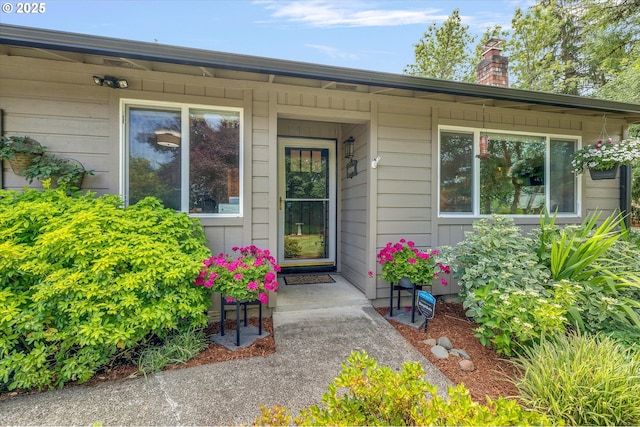 2648 SE Risley Ave, Milwaukie, OR 97267 - view of exterior entry featuring a chimney