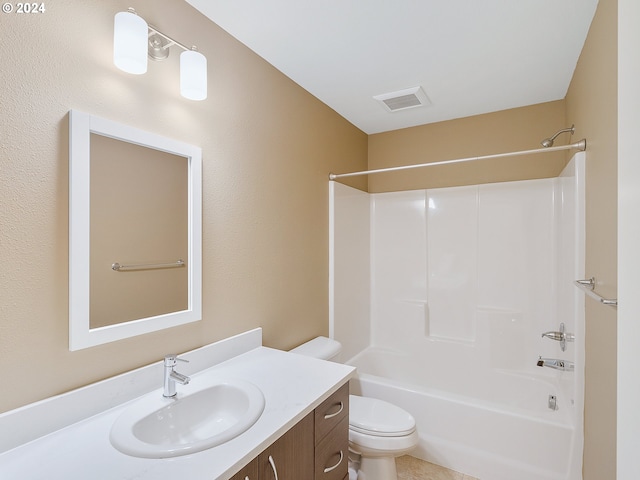 full bathroom featuring vanity, shower / washtub combination, and toilet