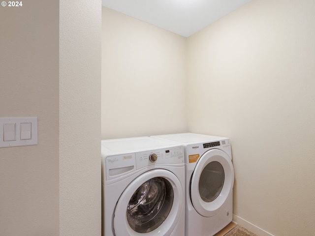 laundry area featuring separate washer and dryer