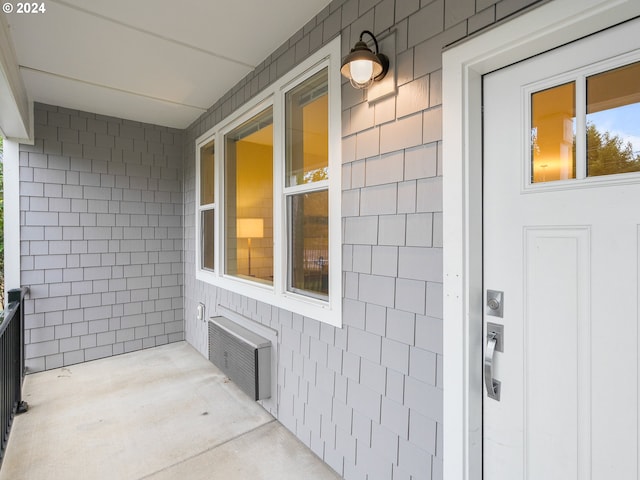 10827 E Burnside St, Portland, OR 97035 - doorway to property with radiator and covered porch