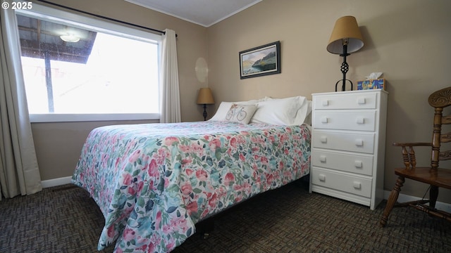 145 E Franklin Ave, Dayville, OR 97825 - bedroom featuring dark carpet and crown molding