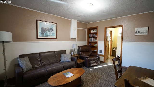 145 E Franklin Ave, Dayville, OR 97825 - carpeted living room with a textured ceiling and ornamental molding