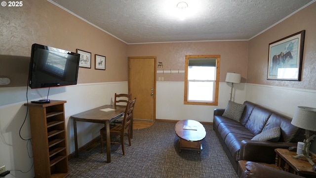 145 E Franklin Ave, Dayville, OR 97825 - living room featuring a textured ceiling, carpet flooring, and ornamental molding