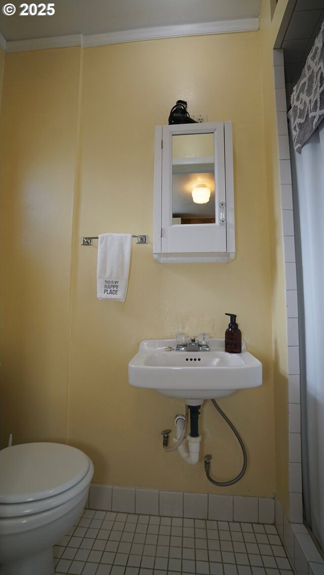 145 E Franklin Ave, Dayville, OR 97825 - bathroom with tile patterned flooring and ornamental molding