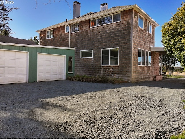 exterior space with a garage