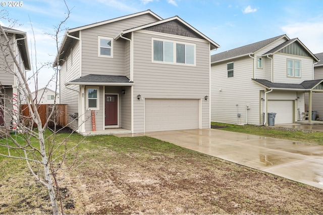 view of front of property featuring a front lawn, driveway, an attached garage, and fence