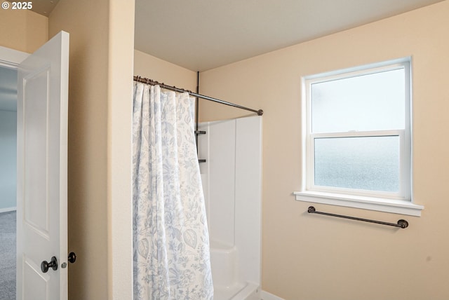 full bathroom with a shower with shower curtain