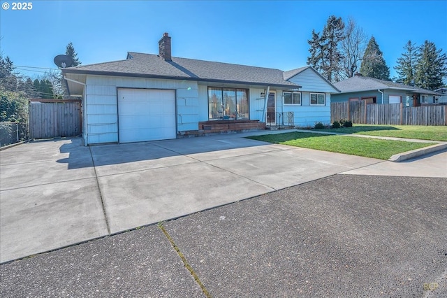 single story home with driveway, a front yard, an attached garage, and fence