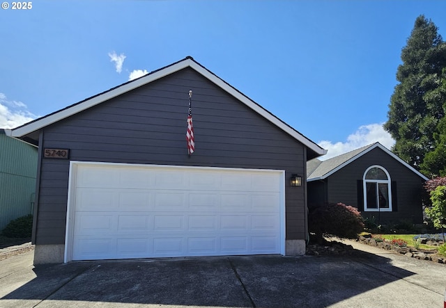 5740 SE Golden Rd, Hillsboro, OR 97123 - view of front of house featuring an outdoor structure and a garage