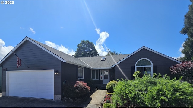 5740 SE Golden Rd, Hillsboro, OR 97123 - ranch-style home featuring a garage, driveway, and a shingled roof