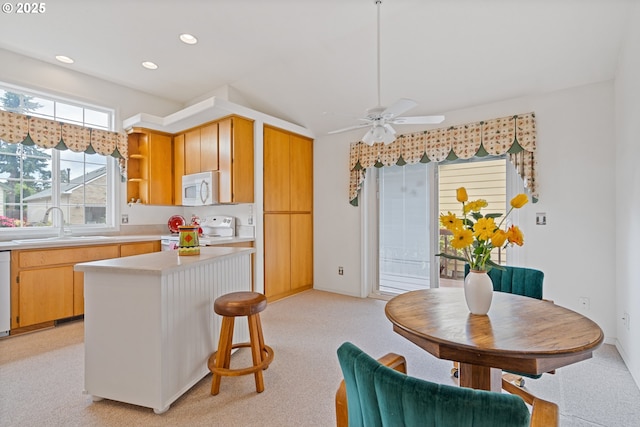 1939 NE Harewood Pl, Hillsboro, OR 97124 - kitchen featuring white appliances, light countertops, a sink, a kitchen island, and open shelves