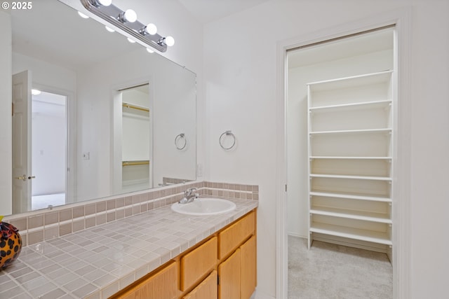 1939 NE Harewood Pl, Hillsboro, OR 97124 - bathroom with a spacious closet and vanity