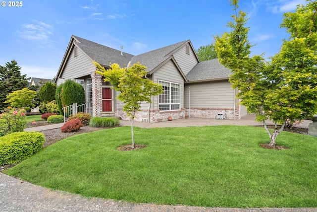 1939 NE Harewood Pl, Hillsboro, OR 97124 - view of front of home featuring a front yard, roof with shingles, and a patio area