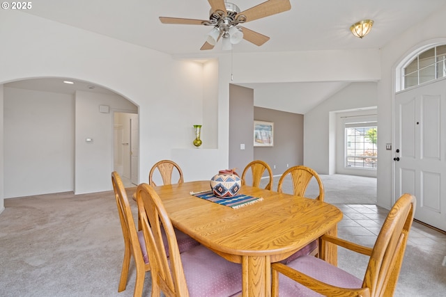 1939 NE Harewood Pl, Hillsboro, OR 97124 - dining room with light colored carpet, ceiling fan, vaulted ceiling, and arched walkways