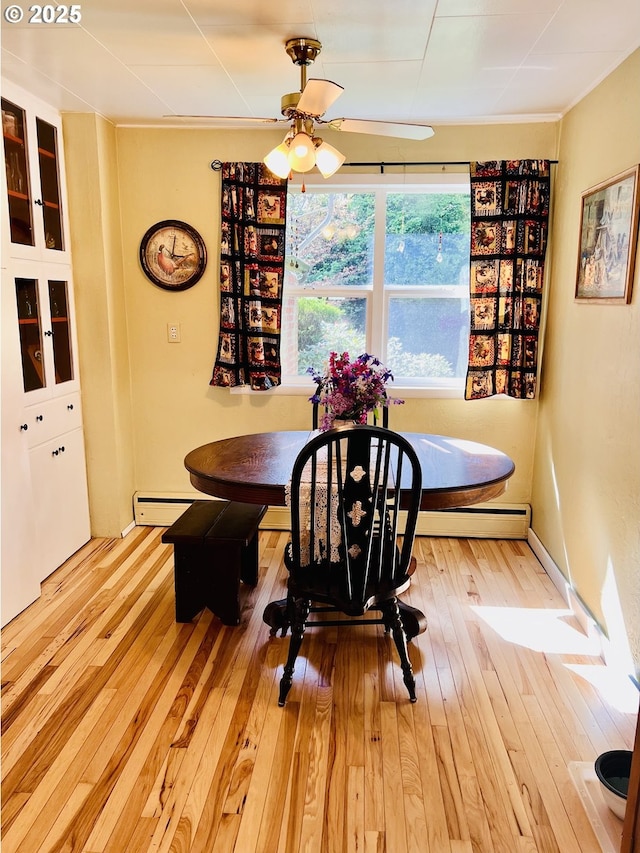 42799 Leaburg Dr, Walterville, OR 97489 - dining room featuring ceiling fan, baseboard heating, and light wood-style floors